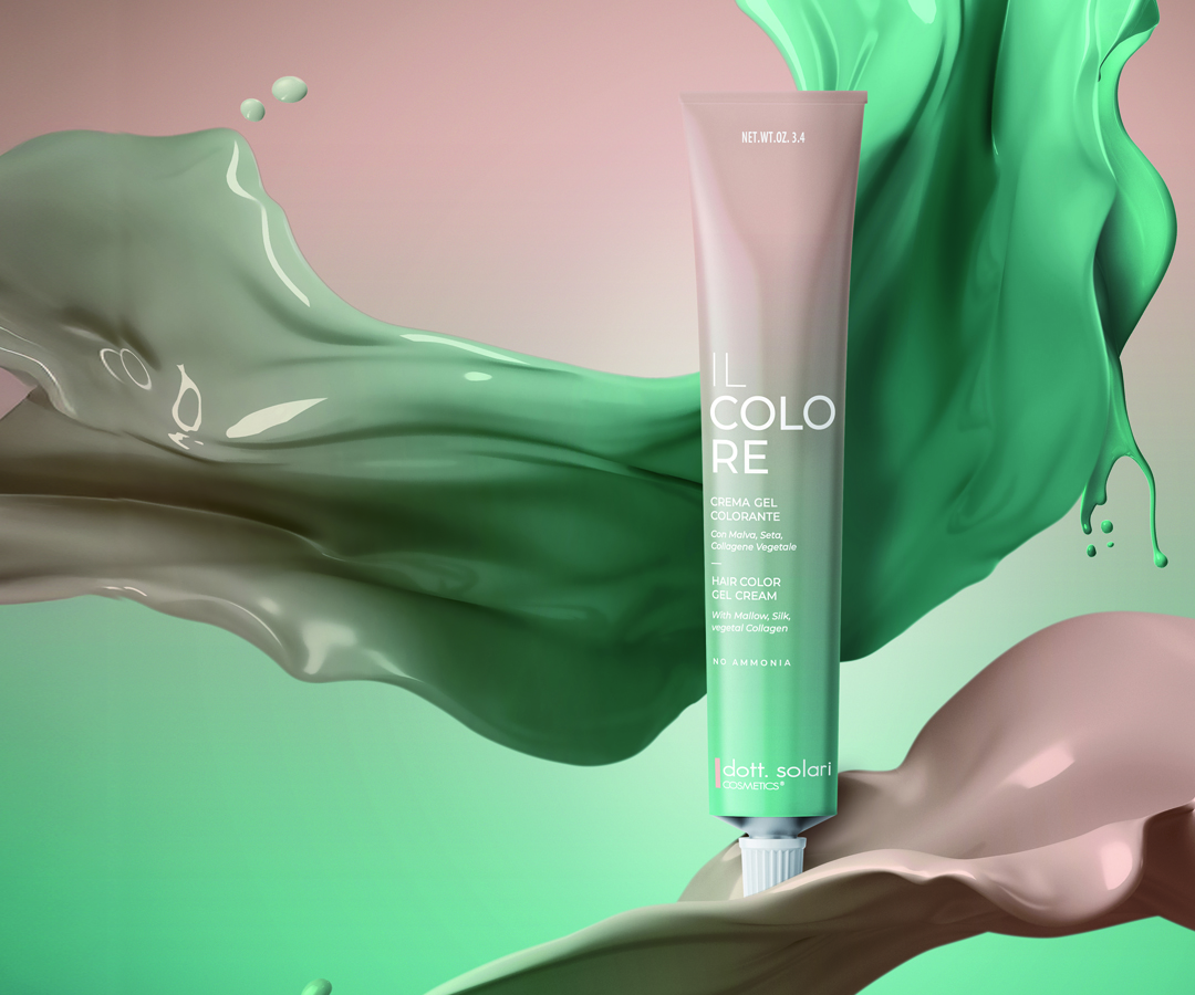 Il Colore hair color cream tube surrounded by swirling paint. Professional hair coloring product, no ammonia formula for vibrant color.
